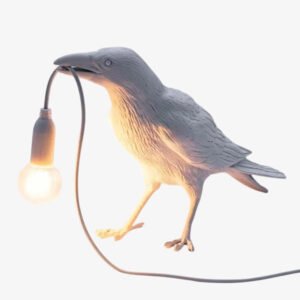Creative crow wall light by NovaLights in black and white